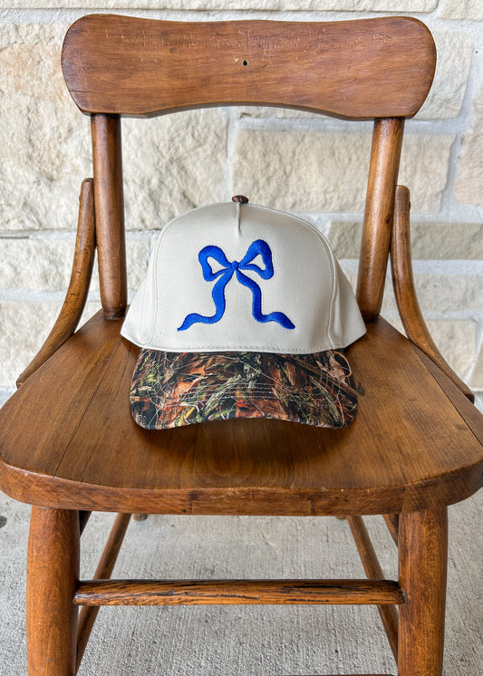 Royal Blue Bow Camo Trucker Hat