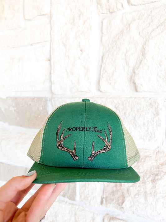 Properly Tied Antlers Trucker Hat